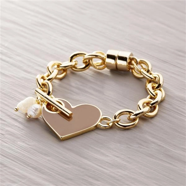 CORAZÓN DE CARAMELO. Pulsera con colgante con corazón