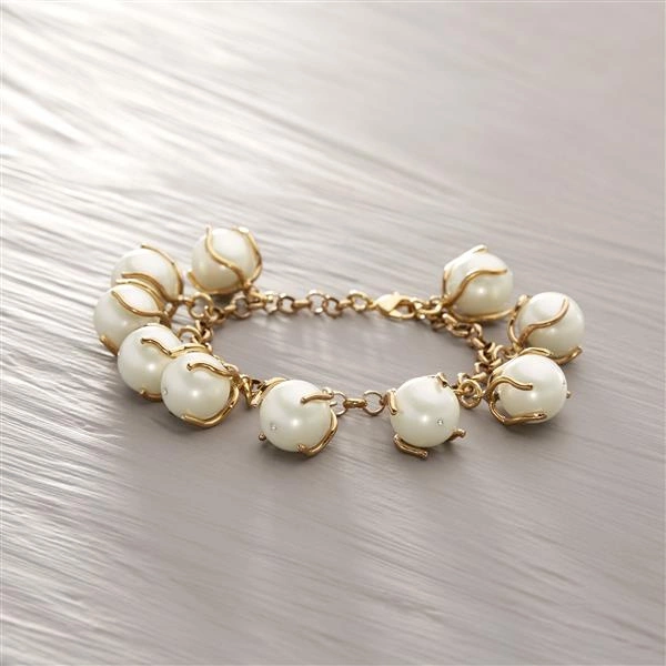 YOU CAN GO YOUR OWN WAY. Pulsera con colgantes