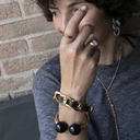 Złota bransoletka łańcuch z paskiem z czarnej ekoskóry. NOC