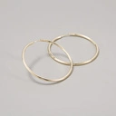 Delikatne pozłacane kolczyki w kształcie zamkniętych kół. MAGICZNE OKRĘGI