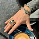 Regulowany pierścień z ciemnoszarym kryształkiem. MAM TO COŚ