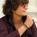 Bransoletka z czarnych paciorków Miyuki ze złotym napisem. CZUŁOŚCI W CIEMNOŚCI