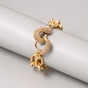 Pozłacana bransoletka z ogniw z ozdobnym zapięciem. FOLIGNO