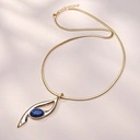 Złocony naszyjnik z dekorem a la nutka z sodalitem. NUTKA SODALITU