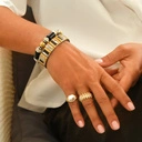 Pozłacany pierścionek w fomie palisady z cyrkoniami. SANTA MONICA