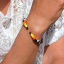 Pozłacana bransoletka z głowami tukanów z cyrkoniami. TOKI TUKANÓW