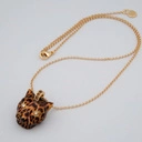 Pozłacany wisior z zawieszką z głową jaguara i cyrkoniami. ZEW DŻUNGLI