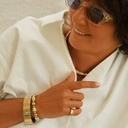 Gładki pozłacany pierścionek z przezroczystą cyrkonią. PARADISE CITY