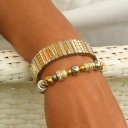 Bransoletka z posrebrzanych i pozłacanych elementów. PLACE VENDOME