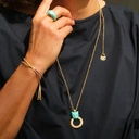 Pozłacany wisiorek z głową małej pantery z ringiem. KOTKA PSOTKA