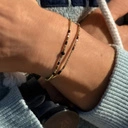 Bransoletka z paciorków Miyuki z akcentem z onyksu. MADAME NOIR