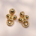 Pozłacane klipsy w formie kropli zdobione kryształkami. KROPLE ŚWIATŁA