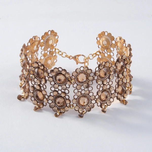 Bransoletka z modułów w ciepłym złocie z kwiatkami. MILLA FIORI