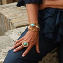 Potrójna bransoletka z turkusową kroplą i perłami. MICHAEL