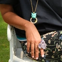 Pozłacany wisiorek z głową dużej pantery z ringiem. INSTYNKT ŁOWCZYNI