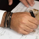 Bransoletka z 2 cylindrami na czarnej plecionej linie. SILNE WIĘZI