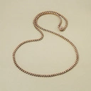 Długi pozłacany naszyjnik z kryształami i ozdobną kulką. OD RANA PO WIECZÓR