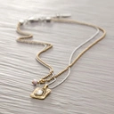 Podwójny wisiorek z zawieszką skarabeuszem. MOC SKARABEUSZU