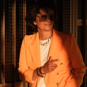 Pozłacana bransoletka z cienkim brązowym rzemykiem. SPLOT ZDARZEŃ