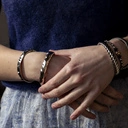 Sztywna srebrzona bransoletka o wytłaczanej powierzchni. SILVER MOON