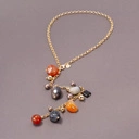 Długi pozłacany naszyjnik z kolorowymi kamieniami. TWOJE ŻYWIOŁY