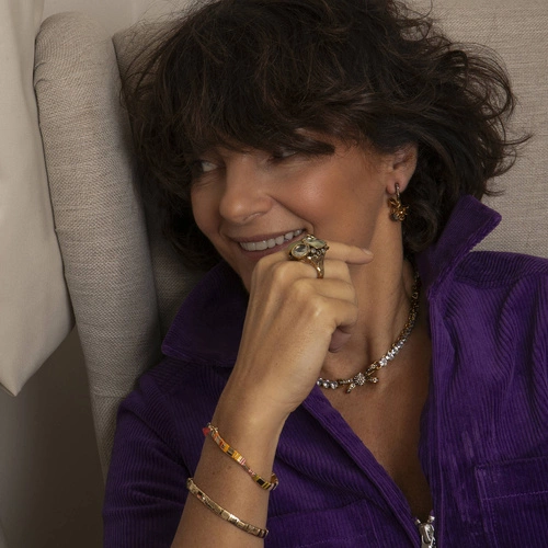 Pozłacane kolczyki kokardki z szarymi kryształkami. BAL DEBIUTANTEK