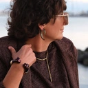 Złocona bransoletka z panterami w kolorze cabernet. SERENA