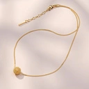 Pozłacany naszyjnik z ażurowym kulistym dekorem. ODDECH RIWIERY