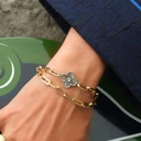 Złocona bransoletka na łańcuchu ze srebrzonym kwiatem. OGRODY SCHONBRUNN