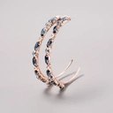 Posrebrzane kolczyki w formie półksiężyców z kryształkami. ISKRZĄCY EREV