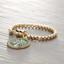 Złota bransoletka łańcuch z zielonym medalionem. DESZCZOWY LAS