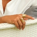 Szeroki pozłacany pierścionek z dziewięciu obrączek. FABRYKA SNÓW