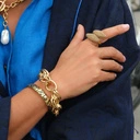 Sztywna pozłacana bransoletka z czarnymi cętkami pantery. GRACJA PANTERY