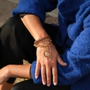 Pozłacana bransoletka z brązowym kordonkiem. TROPIK