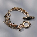 Pozłacana bransoletka z perłami i kryształami. ODYSEJA KOSMICZNA