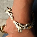 Pozłacany pierścień z głową zebry z cyrkoniami. PASKI MOCY