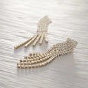 Długie, asymetryczne kolczyki z cyrkoniami. JENNY