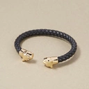 Sztywna skórzana bransoletka ze złotymi głowami panter. POZNAJMY SIĘ