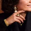 Wąska złocona bransoletka z ażurowym wzorem. PRZEŚWITY SŁOŃCA