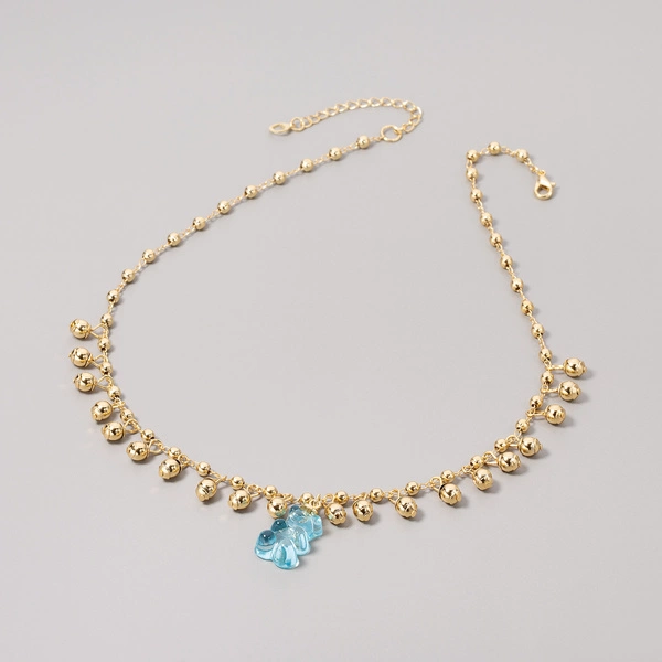 Złocony naszyjnik na łańcuszku z błękitnym misiem. a la żelek. BLUE BEARY