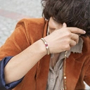 Długi pozłacany naszyjnik z okrągłymi zawieszkami. ZŁOTY SZELEST