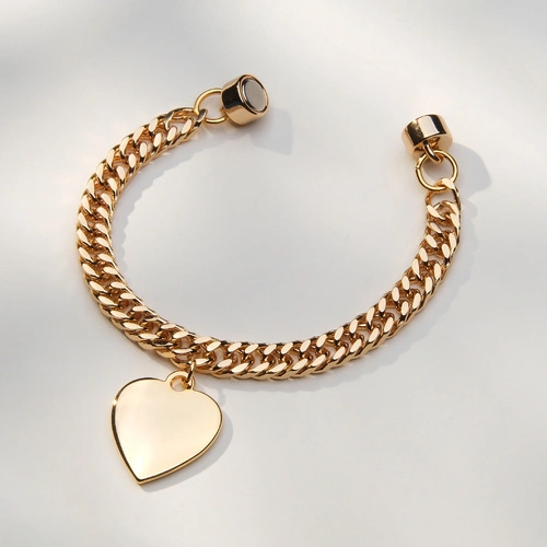 Złocona bransoletka na pancerce z płaskim sercem. SŁOWA TO ZA MAŁO