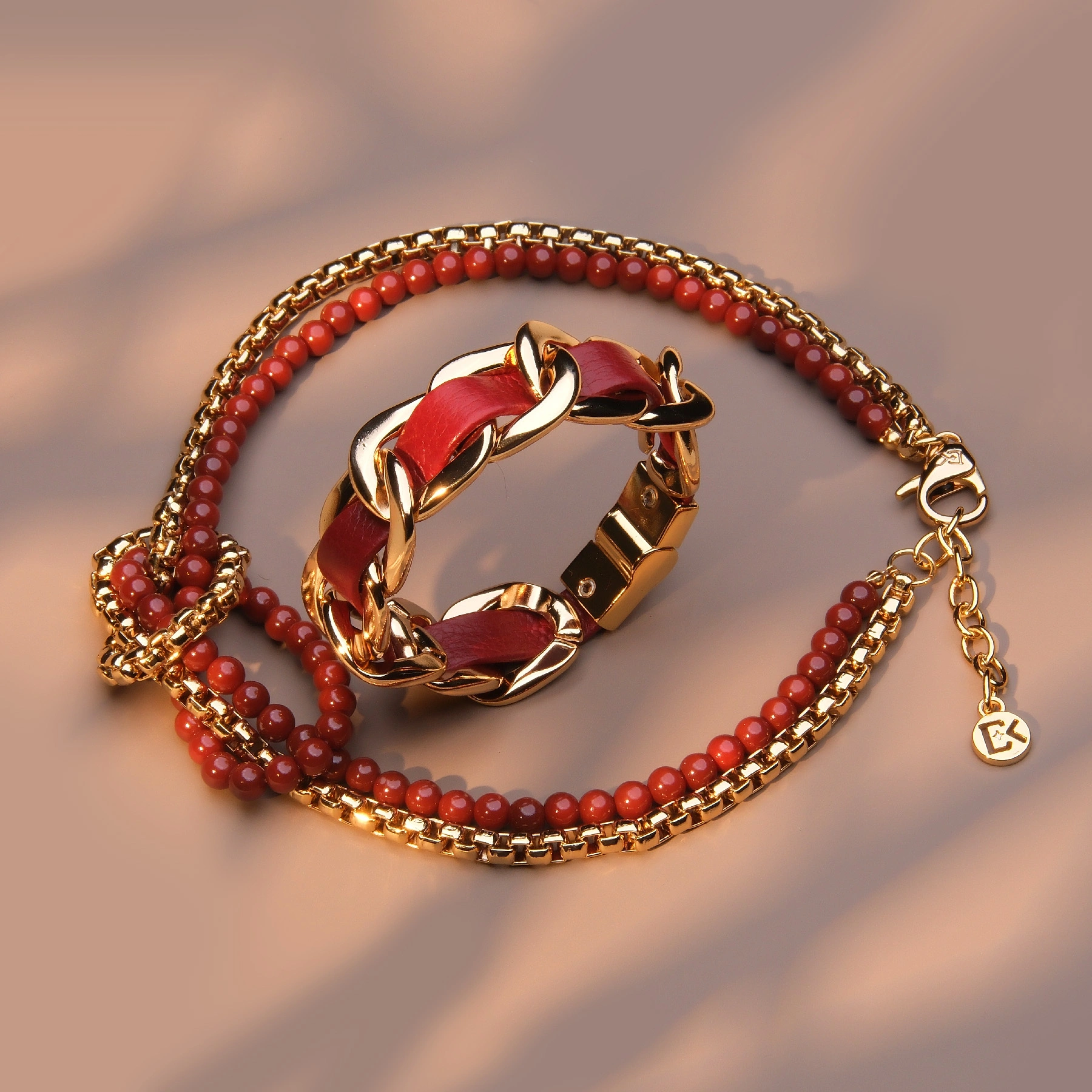 Zestaw bransoletka i naszyjnik w złocie i cabernet. ARTYSTYCZNA DUSZA