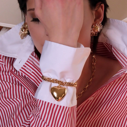 Złocona bransoletka na pancerce z pełnym sercem. TAK MI PASUJE