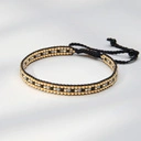 Wąska bransoletka z czarnych i złotych paciorków Miyuki. PUEBLOS BLANCOS