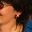 Sztywny pozłacany naszyjnik z ozdobnym spiralnym splotem. SPIRALA ŚWIATŁA