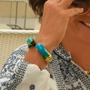 Złocona bransoletka z dwiema głowami papug z cyrkoniami. NIEROZŁĄCZKI