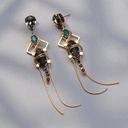 Złocone kolczyki z czarnymi i turkusowymi kryształkami. MAŁE PRAGNIENIA