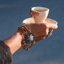 Pozłacany pierścień z motywem kwiatka z cyrkonii. ROSA NOCY