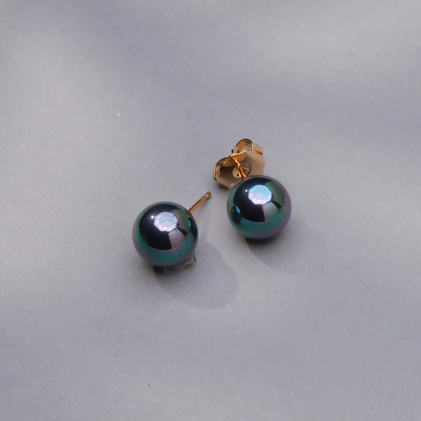 Złocone kolczyki ze szklanymi perłami w kolorze petrol. NOC I MIŁOŚĆ